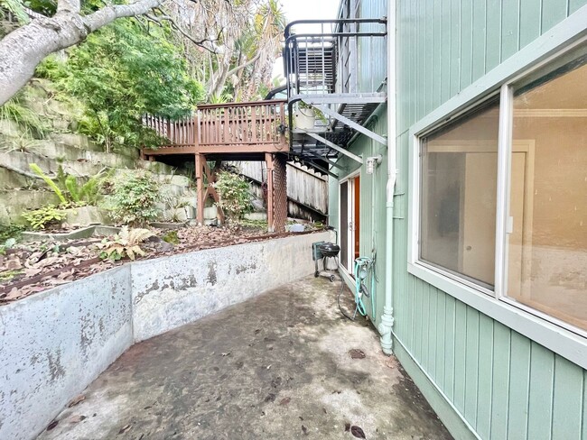 Building Photo - 2BR / 2BA w/ Garage, Outdoor Space, In uni...