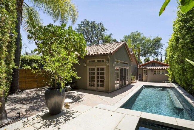 Building Photo - Stunning Spanish-Style Retreat with Pool &...