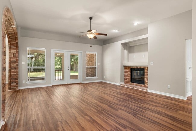 Building Photo - Stunning 4-Bedroom Home with Scenic Lake V...