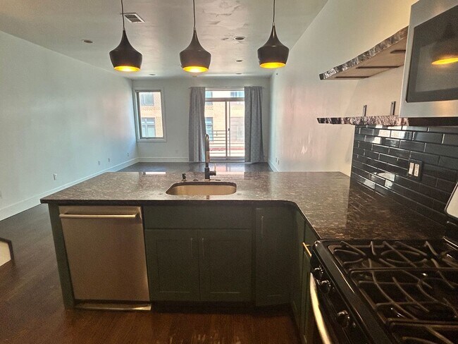 Building Photo - Beautiful Condo with Amazing Roof Top Deck