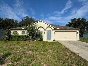 Building Photo - Available Now! Spacious 4-Bedroom, 2-Bath ...