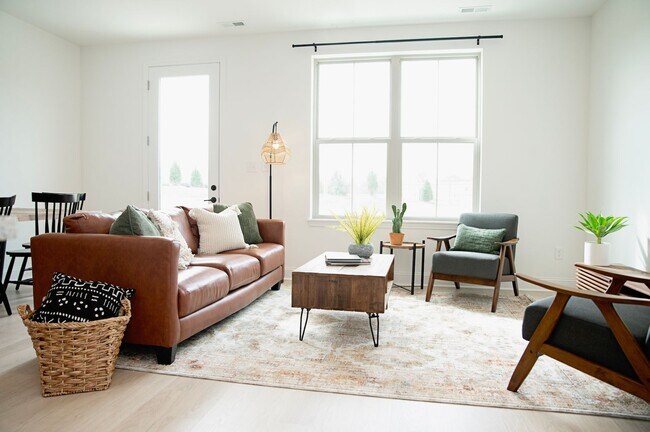 Building Photo - Brand New Construction Townhomes Await at ...