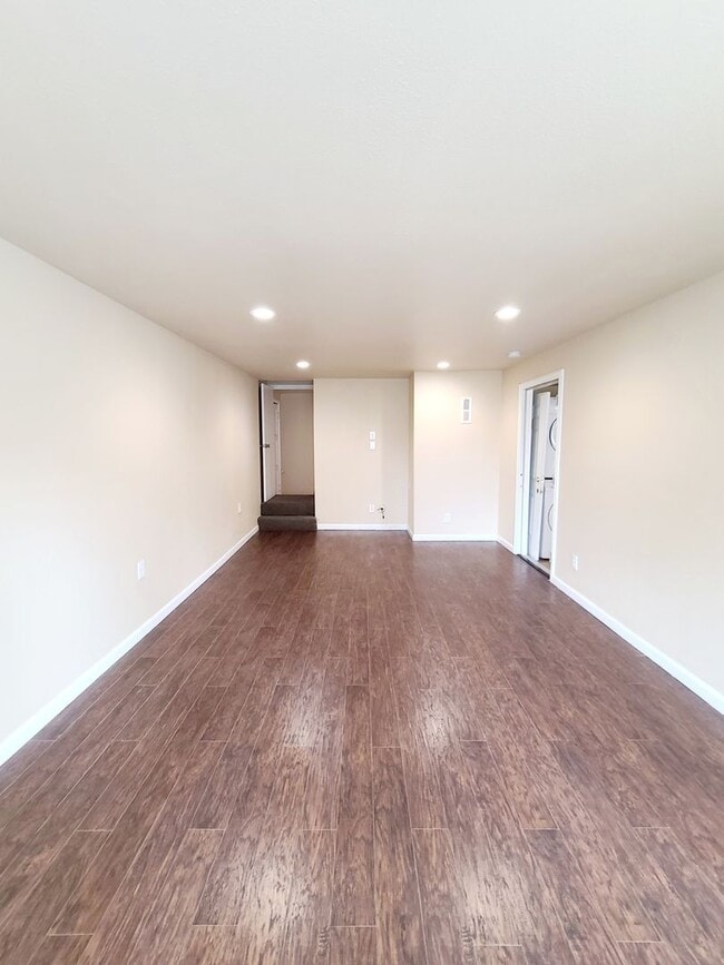 Building Photo - Totally remodeled. Impressive, open floor ...