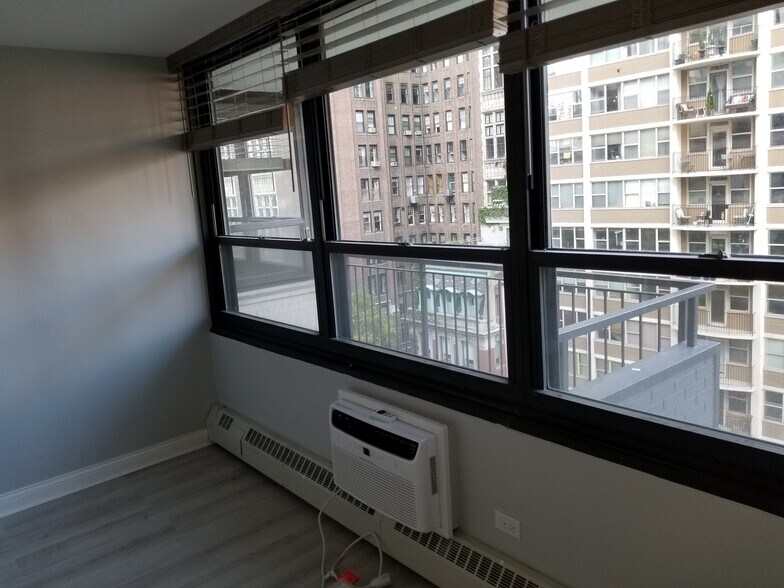 Bedroom and balcony - 33 E Cedar St