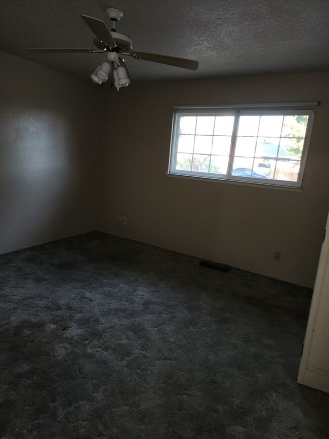 Building Photo - 3 Bedroom 2 bath with 2 car garage off of ...