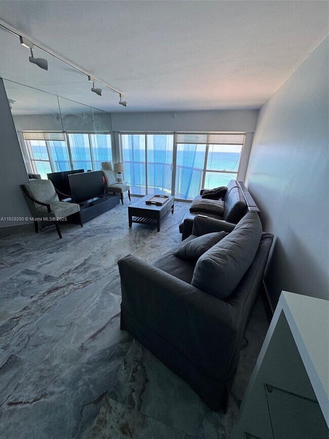 Building Photo - 6767 Collins Ave