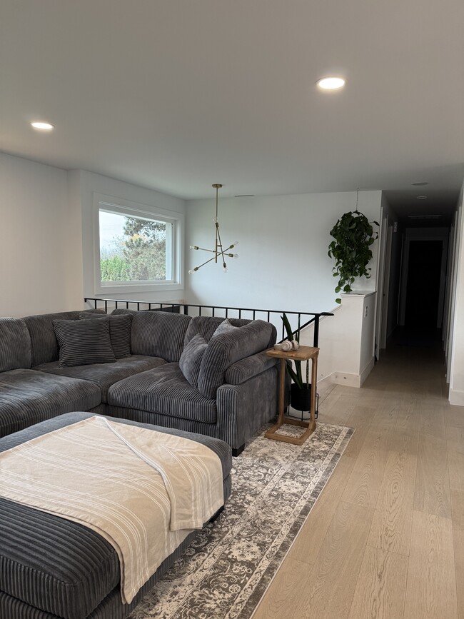 Living room facing entry way - 2715 NE Elaine Dr