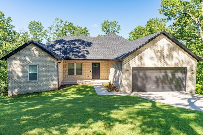 Building Photo - Nearly New Bella Vista Home Nestled in Ultimate Privacy! Furnished options available!