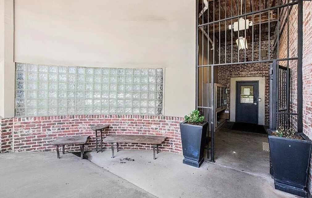 Community breezeway through secured gate and mailbox area. - 320 M L K Jr Dr SE