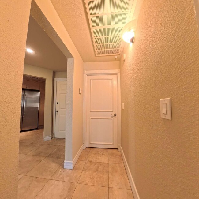 Building Photo - Luxury Mid-Rise | Guard Gated | Underground Garage Area | Resort Style Amenities