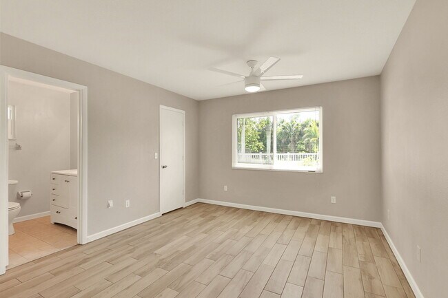 Building Photo - 1612 SE Cascella Ct