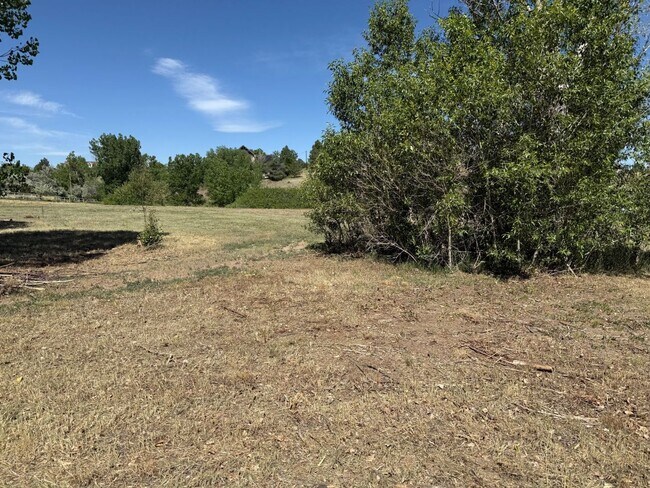 Building Photo - Charming 4-Bed Retreat on 2 Acres with Barn & Garage