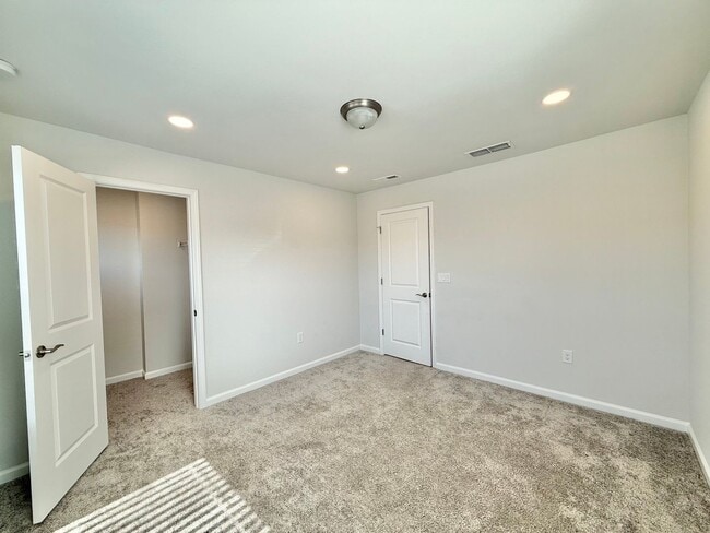Building Photo - Stunning End Unit 3BD, 2.5BA Wendell Townhome with a 2-Car Garage in a Gorgeous HOA Community wit...