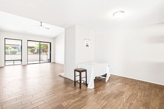 Building Photo - Gated 3-Bedroom Townhome with Fireplace, Patio & 2-Car Garage