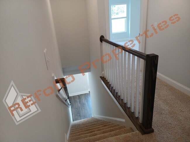Building Photo - Built in 2022! 3 Story 3 Bedroom 1-Car Gar...