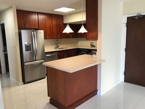 Building Photo - Kealani 2 Bdrm., 2 bath, 1 cov'd/sec'd Pkg. - Pool