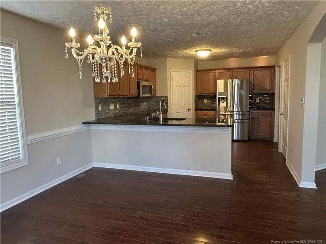 Building Photo - 5918 Lillytrotter Dr