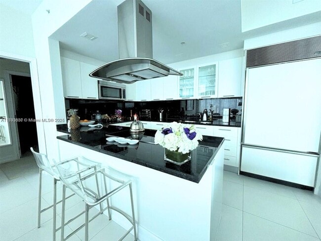 Building Photo - 6899 Collins Ave