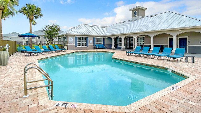 Our sparkling pool is your ticket to escaping the Florida sun and embracing pure relaxation. - Charleston Cay