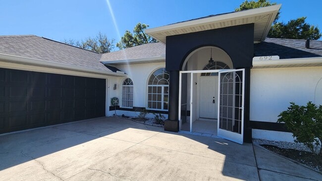 Building Photo - Fresh Paint, New Floors, and a Heated Pool - Move-In Ready!