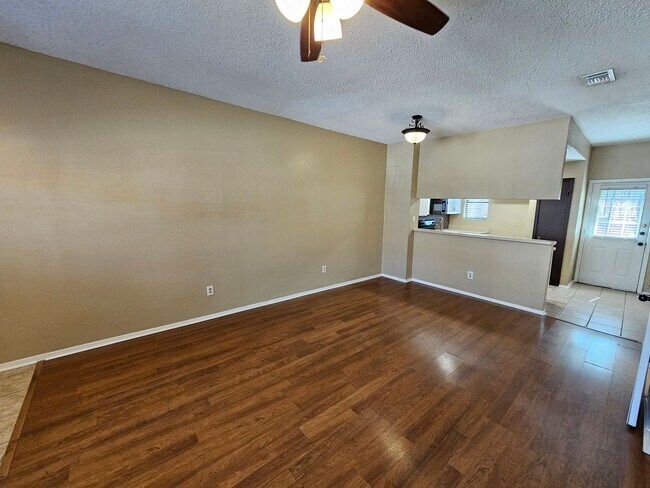 Building Photo - Stunning two-level, two-bedroom, one-and-a-half-bathroom townhome