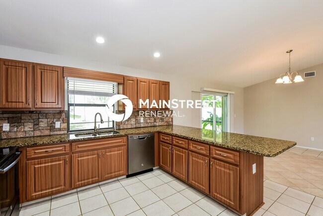 Building Photo - 3 Bedroom Pet-Friendly Home in Cape Coral, FL with Main Street Renewal