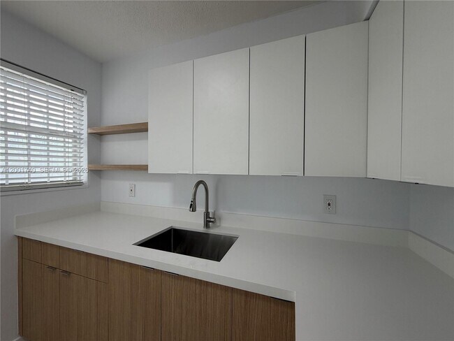 Building Photo - 5990 NE 4th Ct