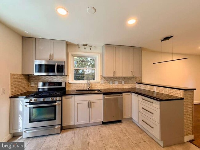 Building Photo - 5015 Fulton St NW