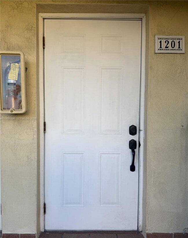 Building Photo - 10101 W Okeechobee Rd