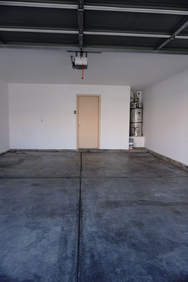 Building Photo - NEWLY RENOVATED 3BD/2BA CONDO W/ 2 CAR GARAGE