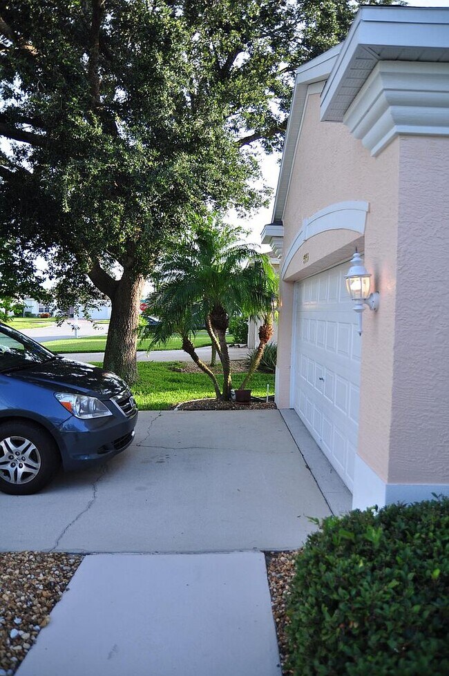 The driveway is nicely shaded in afternoon sun. Great place for a neighborhood barbecue! - 5009 46th St W