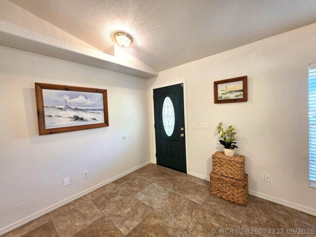 Building Photo - 6707 Coquina Ave