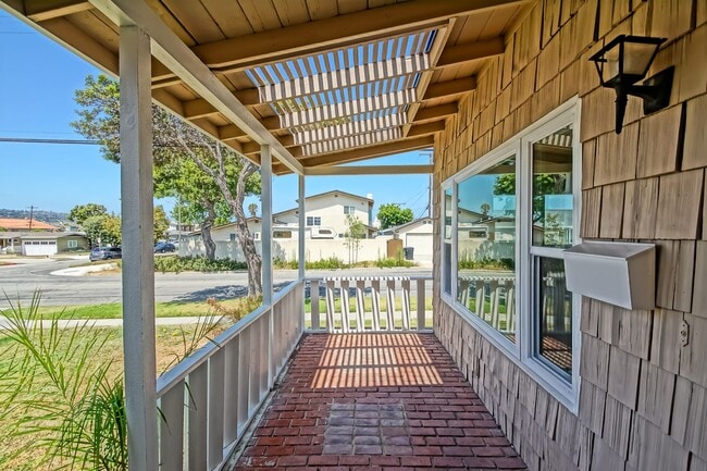 Building Photo - PARTIALLY REMODELED, CHARMING & BRIGHT HOME ON A LARGE CORNER LOT W/ FRONT PORCH, LARGE FRONT LAW...