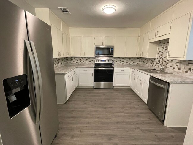 Building Photo - Available Now! Updated 4BR Home with Large Yard, Storage Shed & Modern Finishes