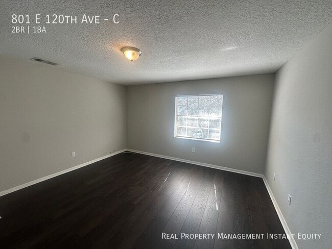 Building Photo - 801 E 120th Ave