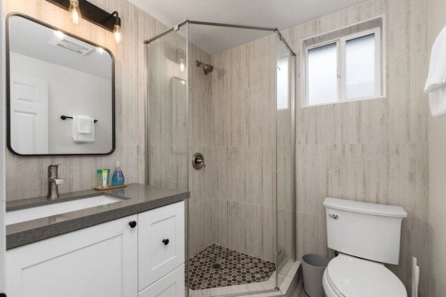 Building Photo - Beachside 3BR Home | Remodeled | AC | Garage Parking | Walk to Boardwalk