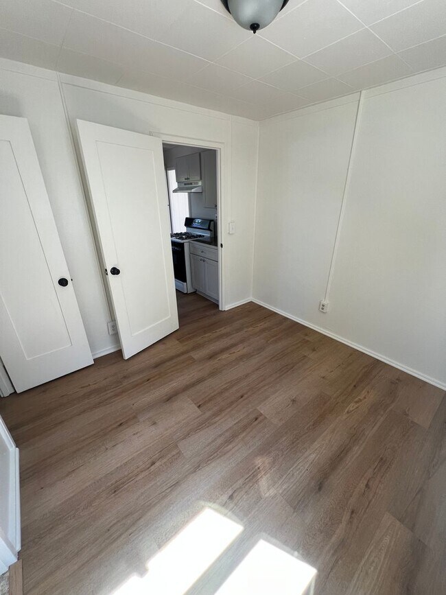 Building Photo - CHARMING! Remodeled 2 Bedroom home with storage and yard