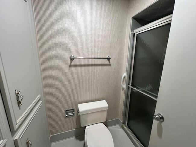 Building Photo - Step into this inviting, sunlit home where space and comfort blend seamlessly