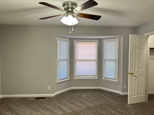 Building Photo - Just Painted and New Flooring Throughout! ...