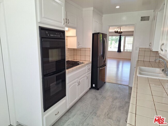 Building Photo - 6446 Riggs Pl