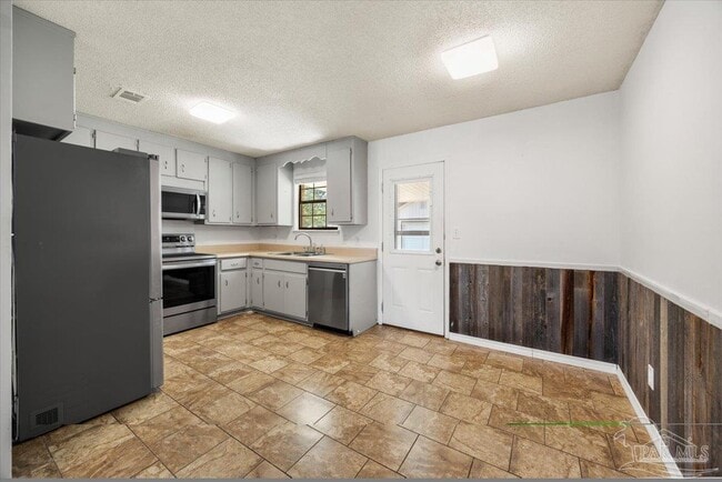 Building Photo - 5135 Nekole Dr