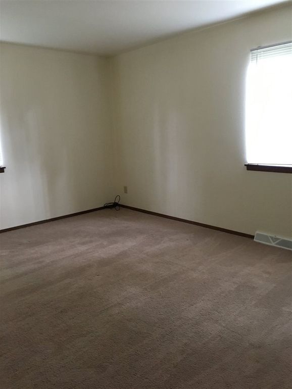 Bedroom in Unit 2 has wall to wall carpet (not shown) - 2609 Smithfield Dr