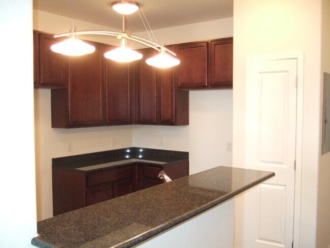 Building Photo - "Spacious 3-Bedroom Denver Condo with Cozy Fireplace & Modern Comforts!"