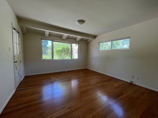 Building Photo - A hidden gem with tree-top view. Tranquil and private. Light and airy