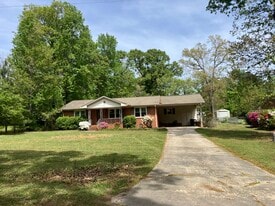 Front of house showing 2 car carport - 3608 Red Bud St