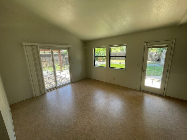 Building Photo - Central Chico, 3/2 fenced yard, 2 car garage, Gardener included, Solar, Fireplace, Craftsman Pergola