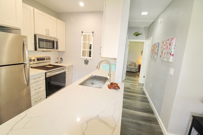 Building Photo - Newly Renovated from Floor to Ceiling and ...