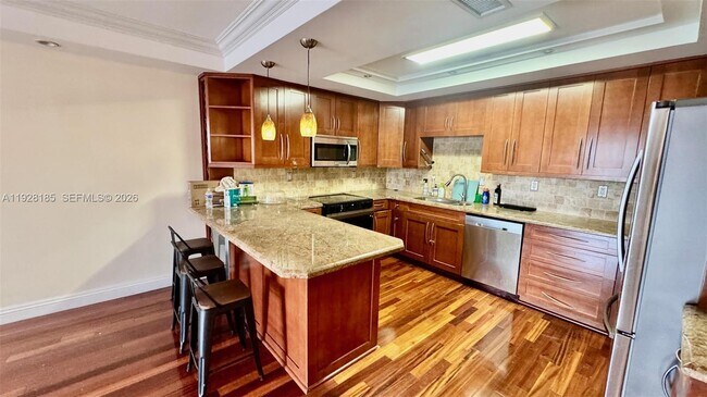 Building Photo - 19390 Collins Ave