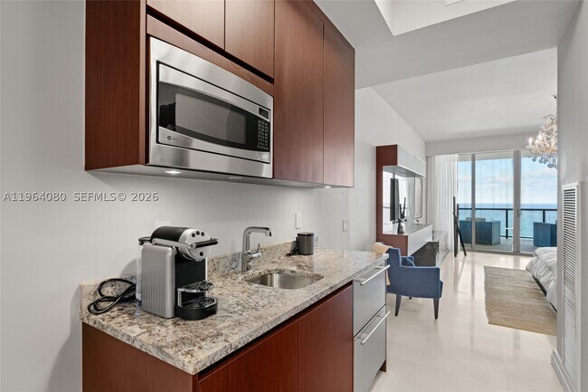 Building Photo - 9703 Collins Ave
