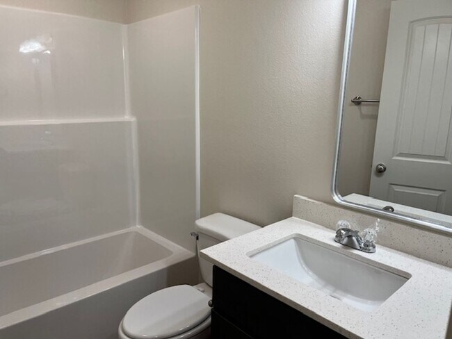 Building Photo - Introducing a newly constructed 3-bedroom, 2-bathroom house in the desirable location of Russellv...